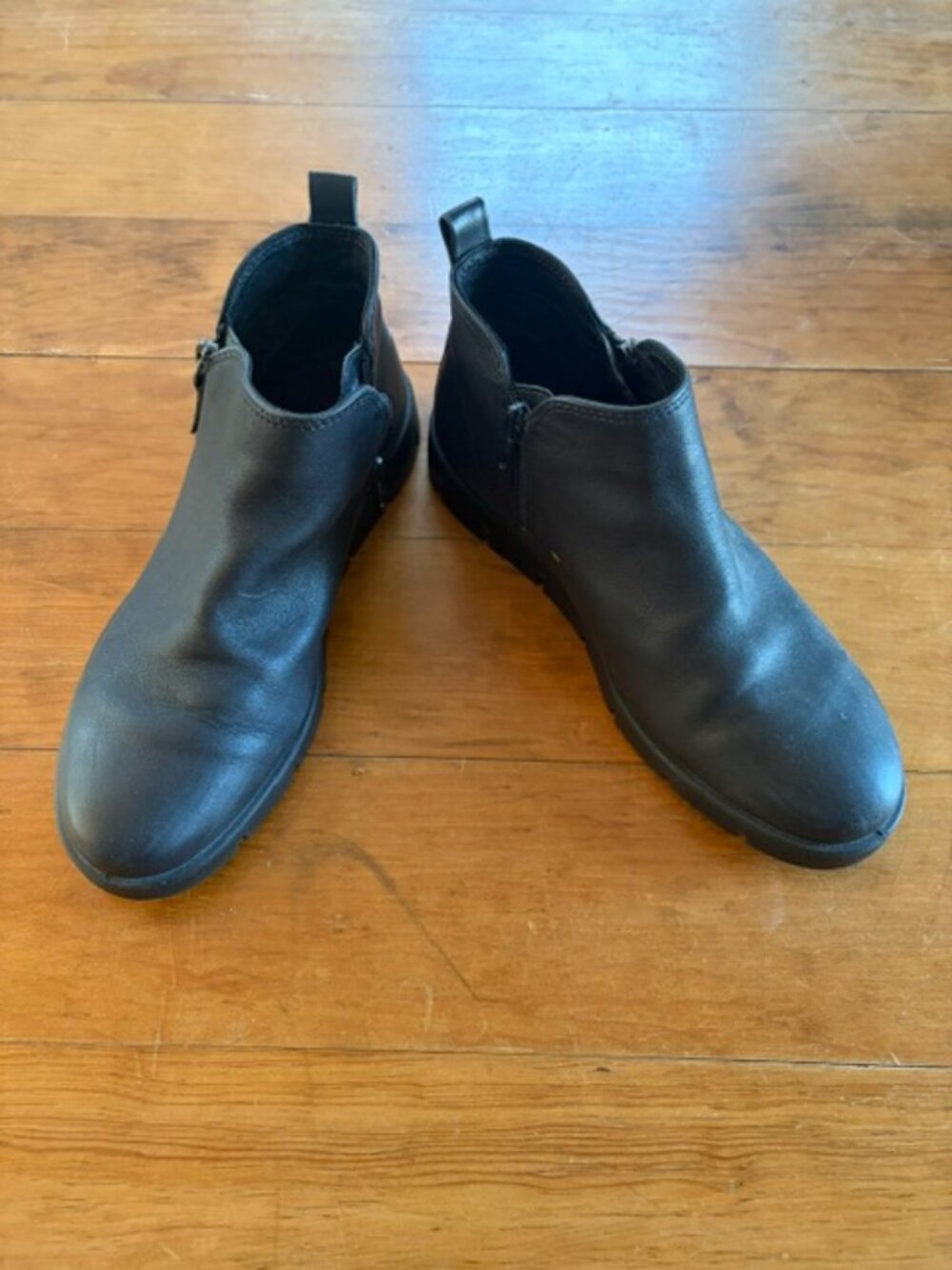Ecco black leather ankle  booties with two side zippers and black rubber soles